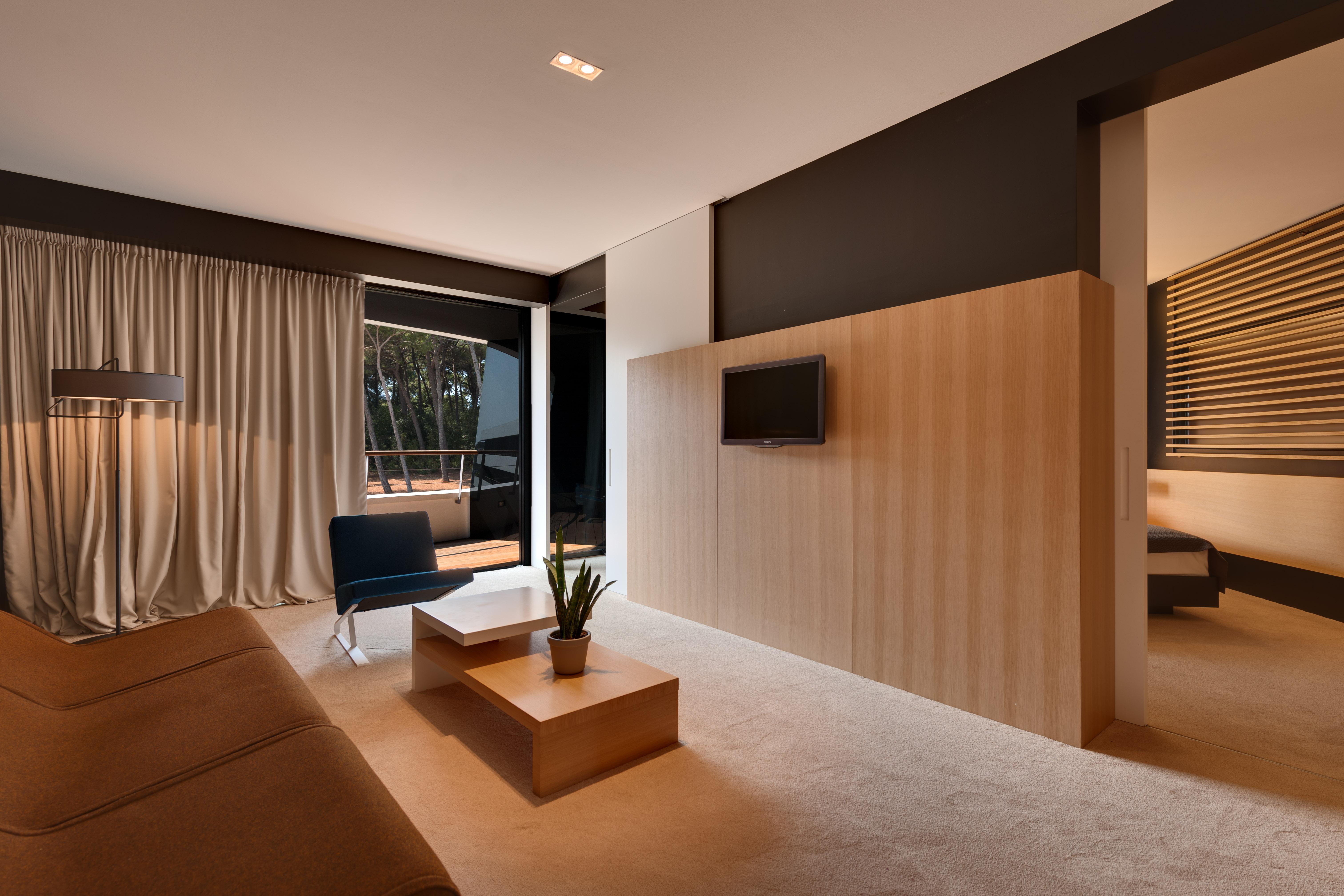 فندق لون روفينج المظهر الخارجي الصورة A 3D rendering of a hotel room