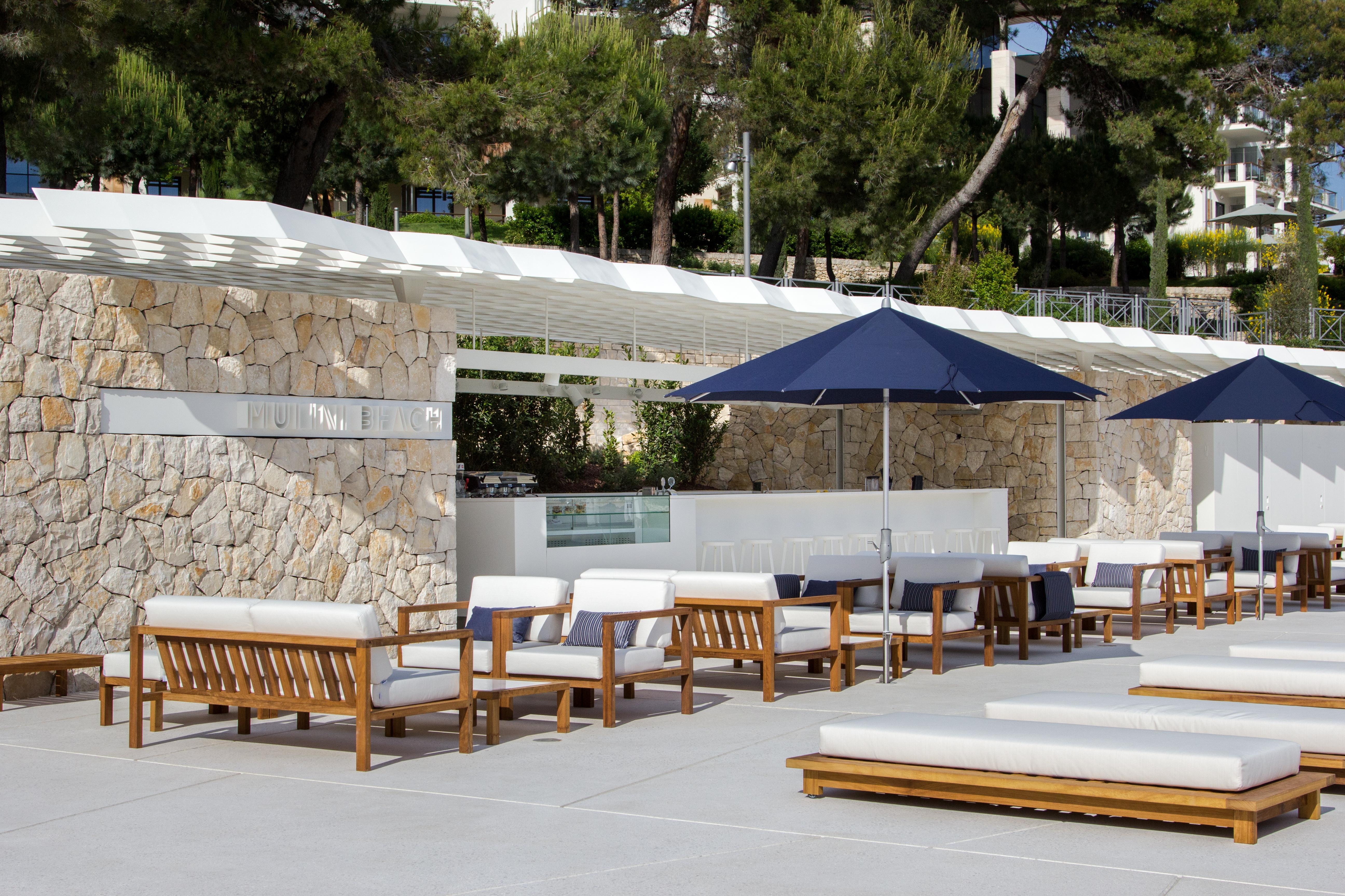 فندق لون روفينج المظهر الخارجي الصورة The beach club at the Hotel Eden Roc Capiminar